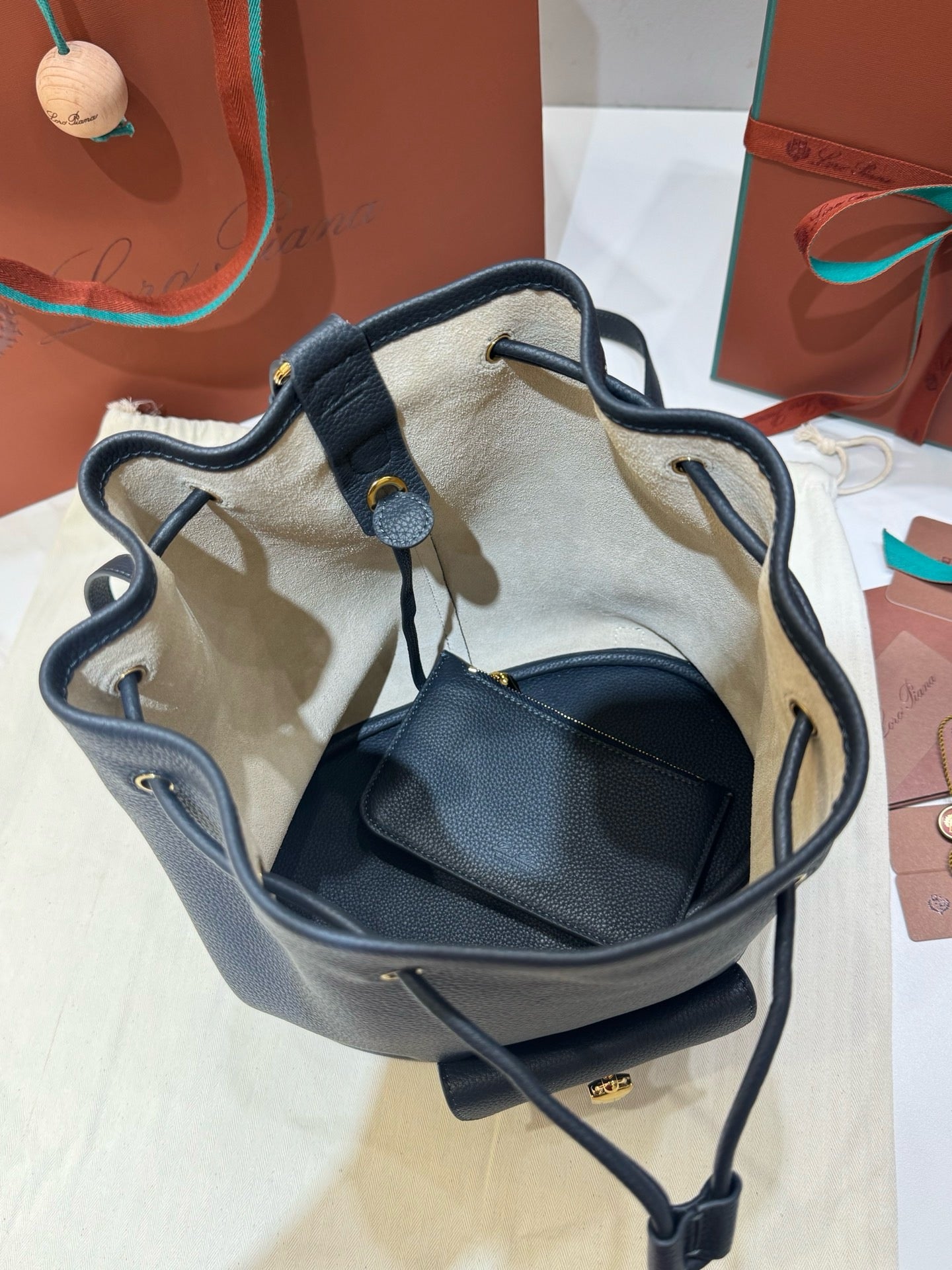 L 엑스트라 드로스트링 백팩