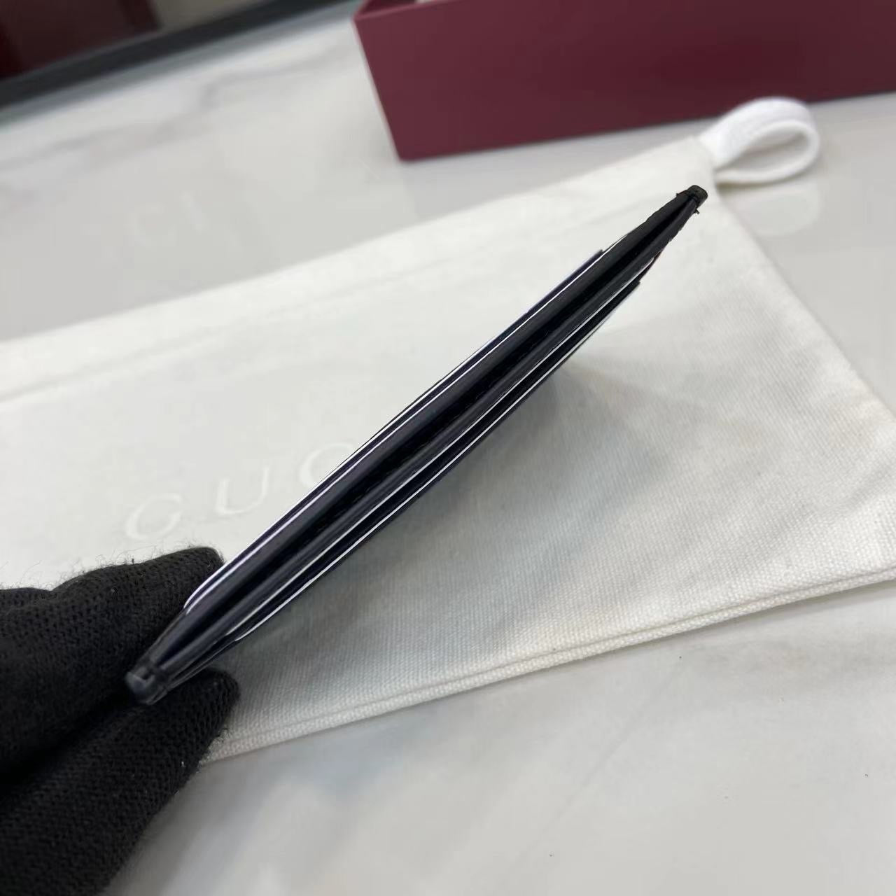 구찌 블랙 GG 레더 임프린트 카드 홀더