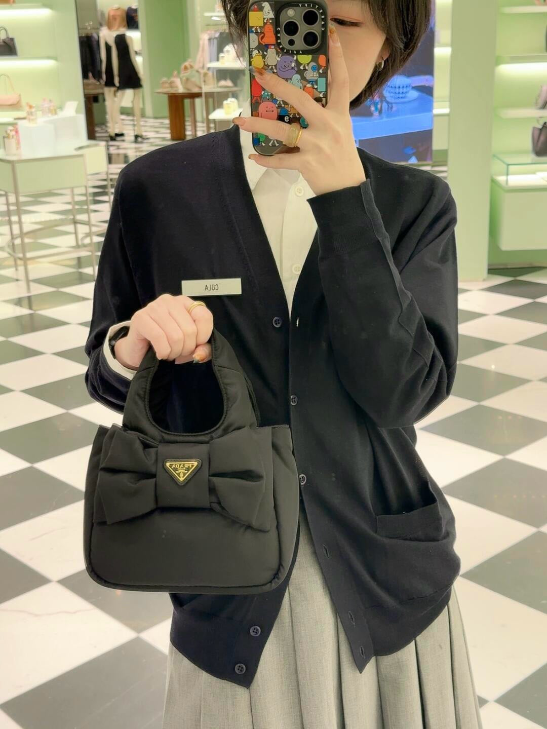 프라다 리본 장식 패딩 리나일론 미니백
